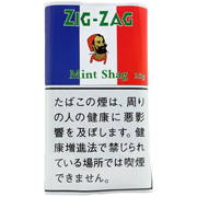 Zig-Zag Mint Shag 袋装参考包装：蓝白红三色竖栏上为ZIG-ZAG和人物头像，下方绿色Mint Shag，白底日文警示